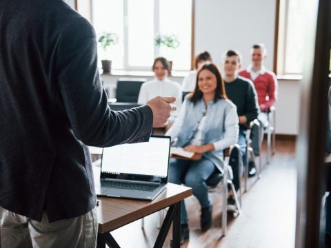 cheerful-mood-group-people-business-conference-modern-classroom-daytime_146671-16287